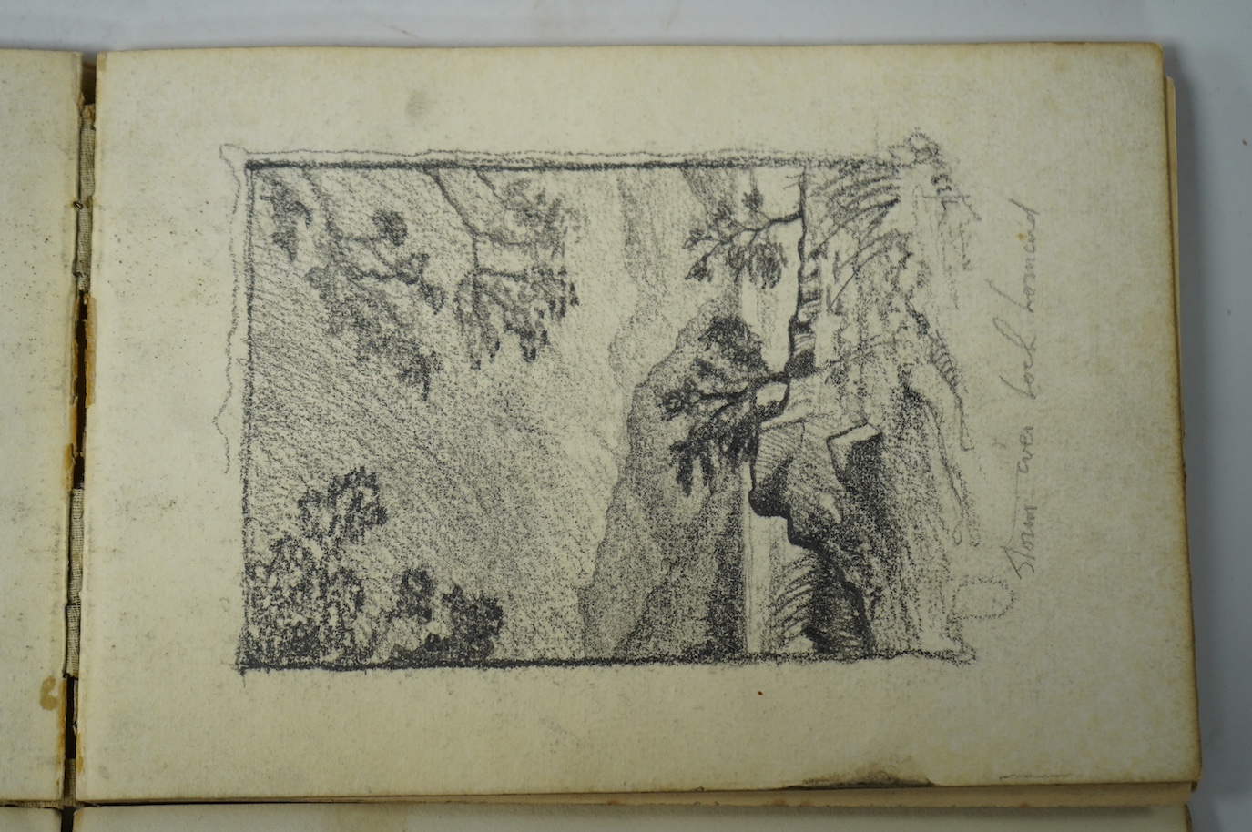Two 20th century sketch books with watercolour, charcoal and paper sketches, some of Scottish landscapes and Art Deco portraits. Condition - fair